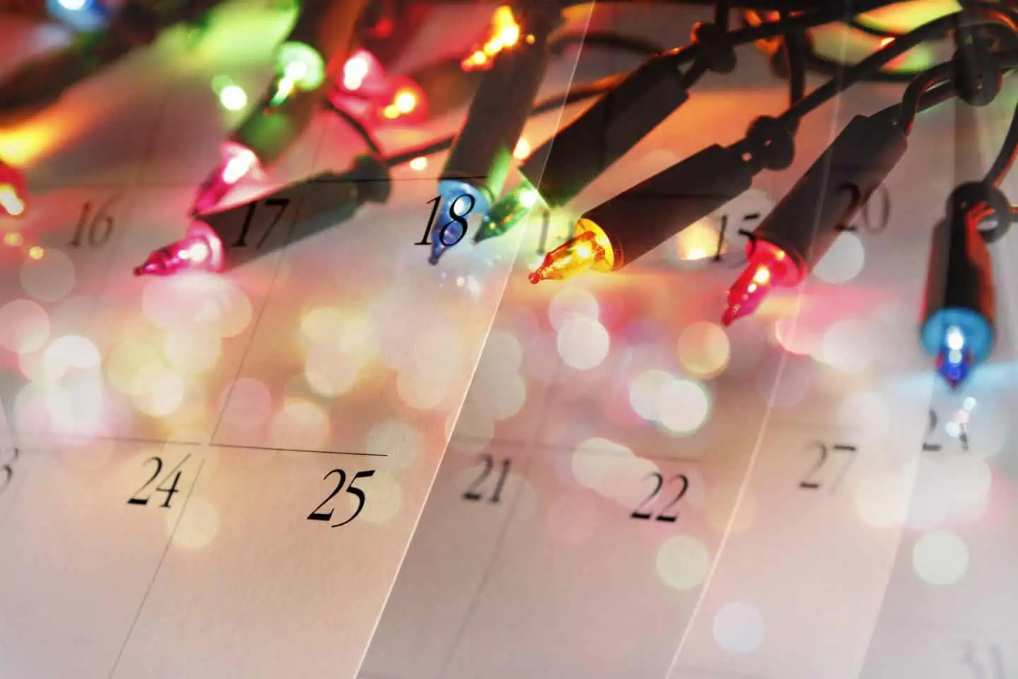 Christmas lights and calendar pages