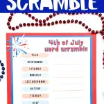 A 4th of July word scramble printable featuring a red background with patriotic decorations and scrambled words alongside their solutions, such as 'July,' 'fireworks,' and 'independence.