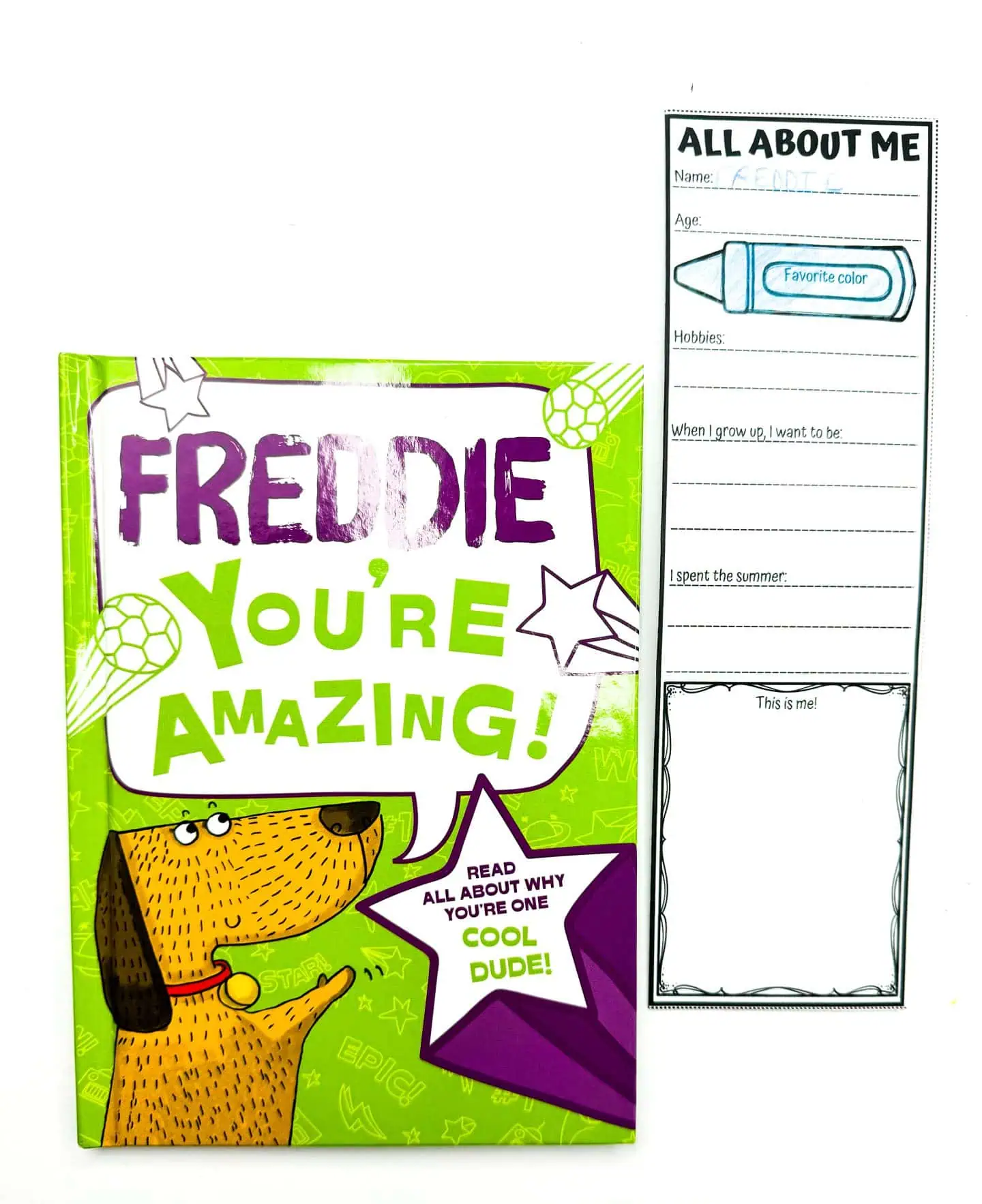 Children's personalized activity book cover titled 'FREDDIE YOU'RE AMAZING!', featuring a cartoon dog with text bubbles 'READ ALL ABOUT WHY YOU'RE ONE COOL DUDE!', adjacent to a 'All About Me' personal detail form.