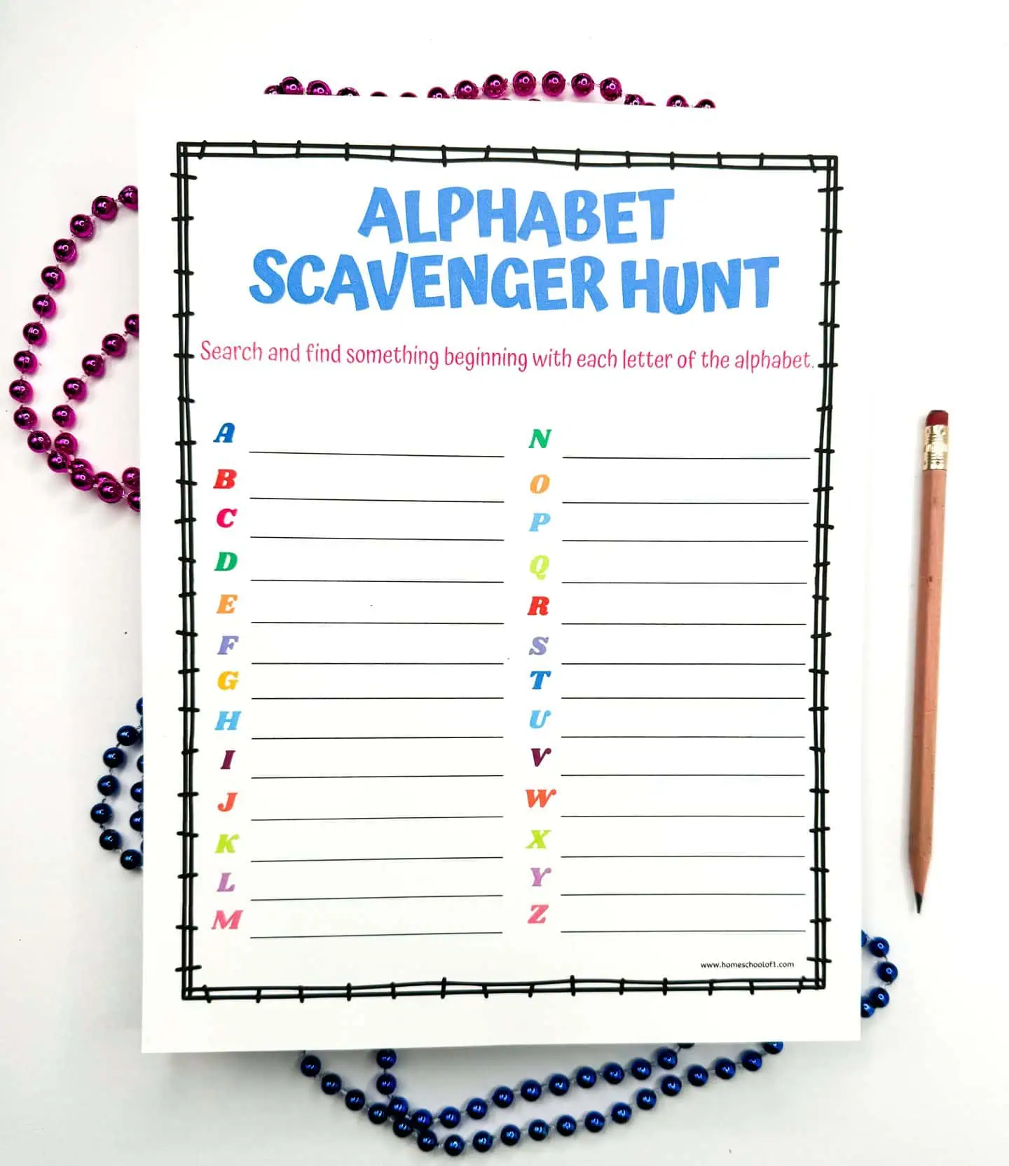 An Alphabet Scavenger Hunt worksheet with a blue header and a list from A to Z with blank lines for answers, accompanied by purple and blue beads and a pencil.