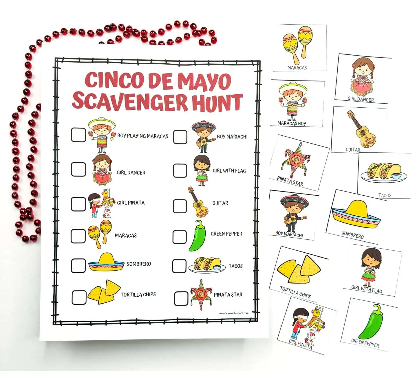 A 'Cinco de Mayo Scavenger Hunt' sheet laid out flat with scattered illustrations and red beads, depicting various cultural items like a sombrero, tacos, and a boy playing maracas, against a white background.