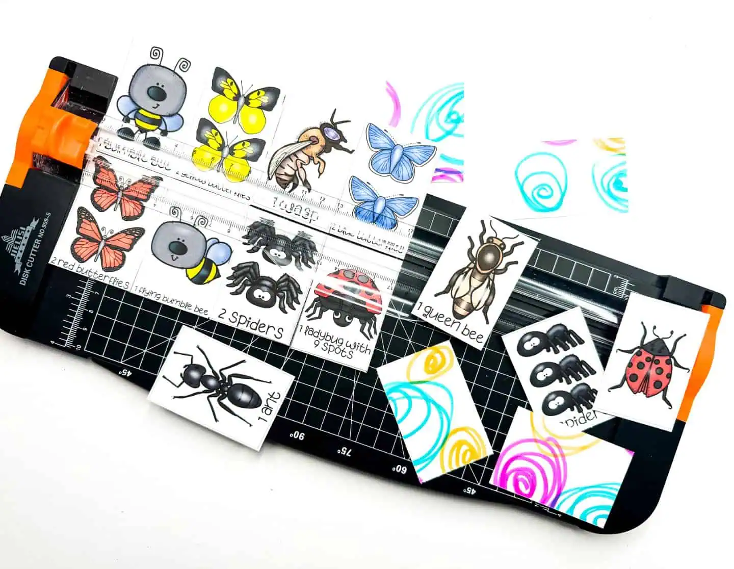 cutting out the insect matching game cards