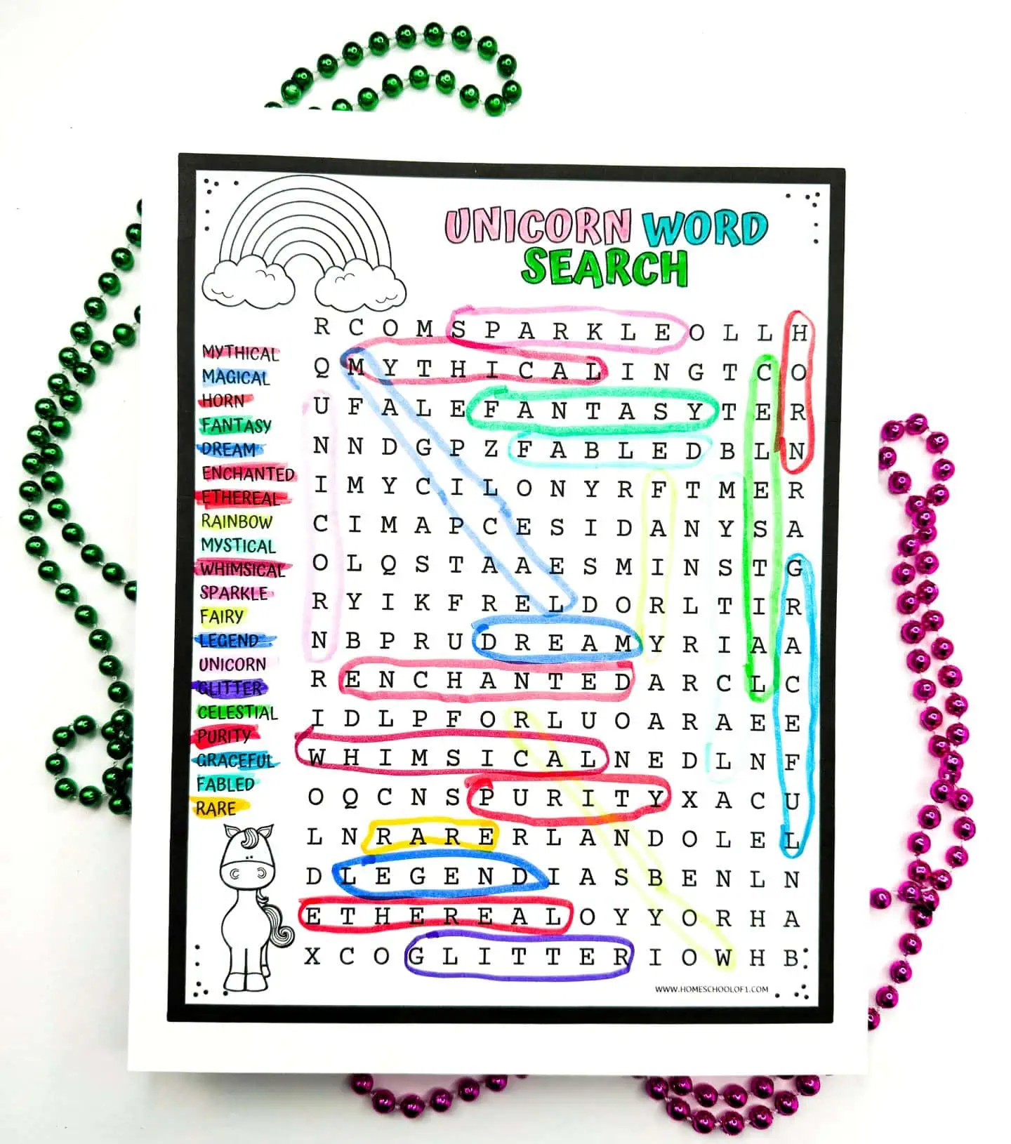 Colorful Unicorn-themed word search worksheet with words such as 'MYTHICAL', 'SPARKLE', and 'FAIRY' circled in vibrant colors, decorated with pink and green beads.