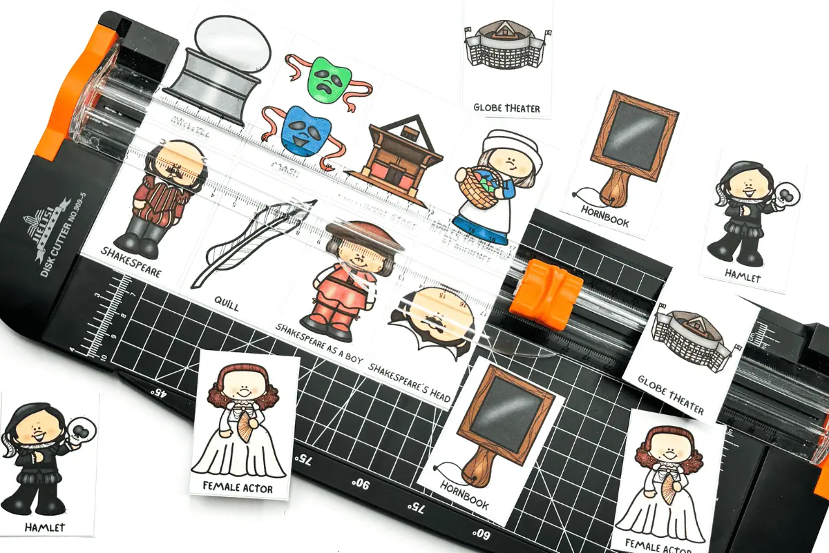 Preparation of 'Shakespeare Memory Game' cards on a paper cutter, with colorful illustrations of Shakespearean characters and items ready to be cut out and used in the game