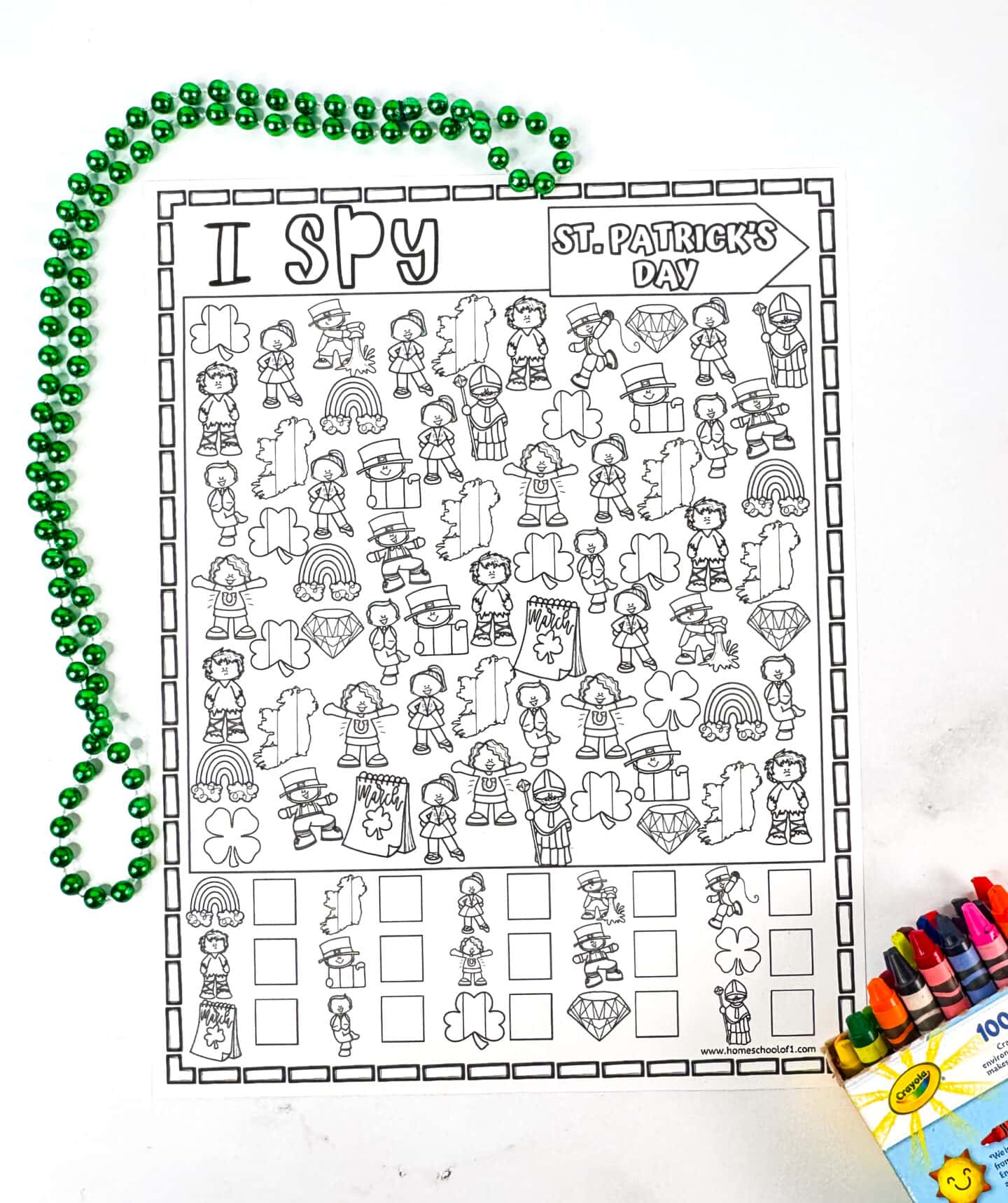 Black-and-white St. Patrick’s Day I Spy coloring page for kids to color and count different festive objects.